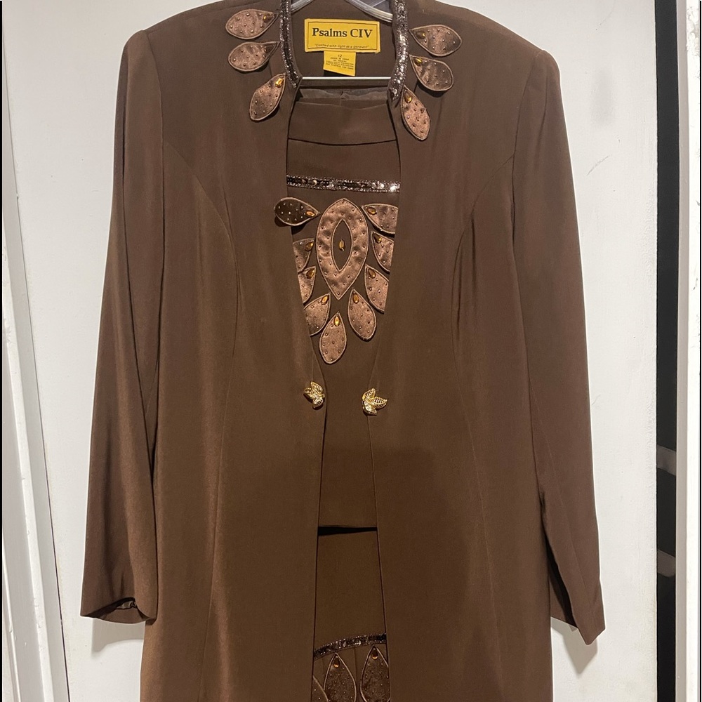 Brown 2 piece suit with jacket insert.